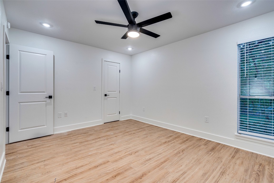202 East 45th Street, Unit 202 Austin, TX 78751 - Photo 22 of 29 Unfurnished room with light wood-type flooring, a ceiling fan, and recessed lighting