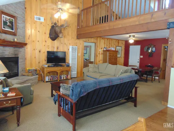 a bed room with a bed and a television