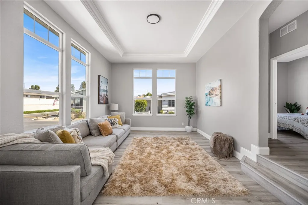 10550 Western, Unit 32 Stanton, CA 90680 - Photo 1 of 1 a living room with furniture and a window