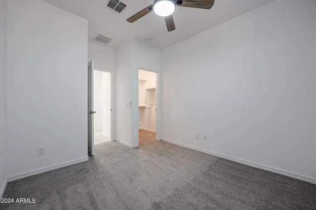 an empty room with a bathroom