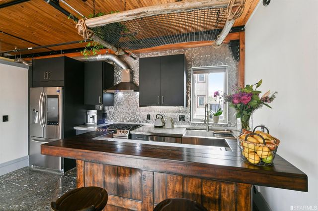 a dining table with chairs and a table