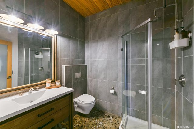 a view of a hallway with washer and dryer