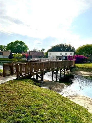 a view of a lake with sitting area