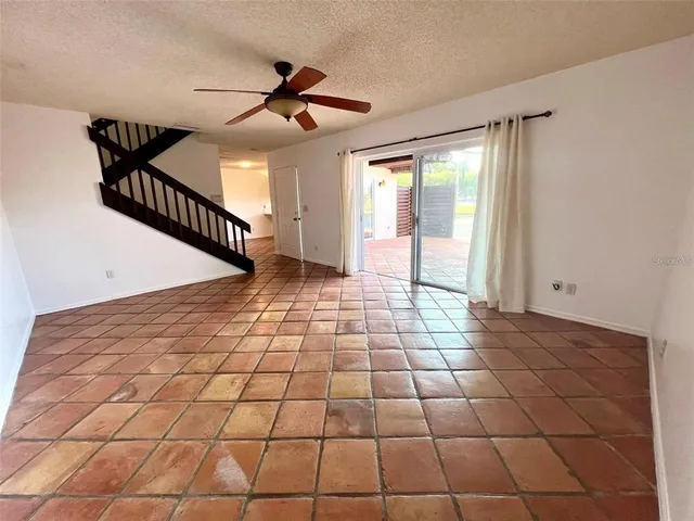 a view of empty room with windows