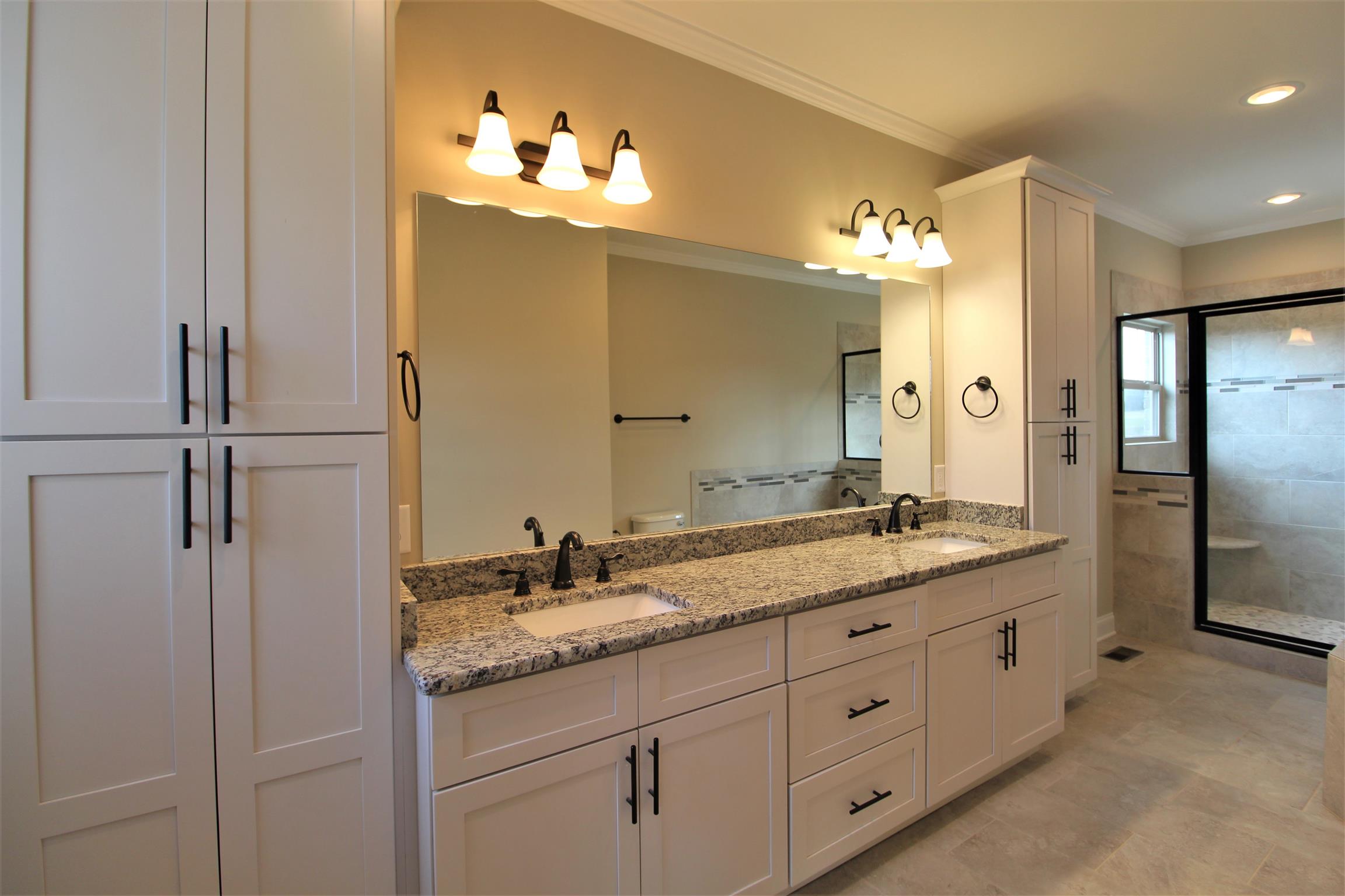 2139 Turner Road Watertown, TN 37184 - Photo 13 of 30 a bathroom with a granite countertop sink double and mirror