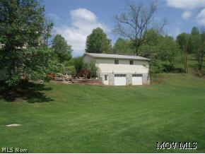 238 Rt 47 Smithville, WV 26178 - Photo 3 of 10 Garage Back View