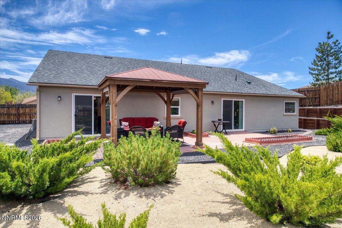 104 Bethpage Road Dayton, NV 89403 - Photo 45 of 65 a front view of a house with a yard