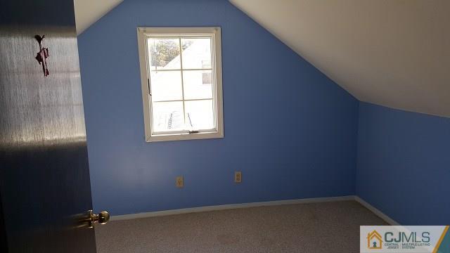 63 Ashley Road Edison, NJ 08817 - Photo 14 of 21 an empty room with windows