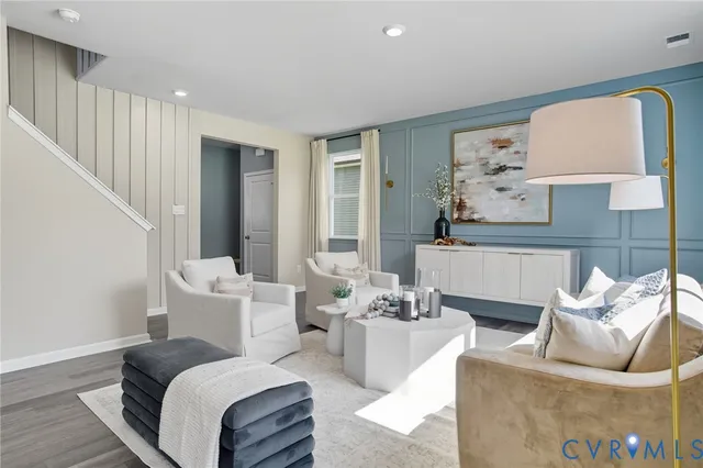 a living room with furniture and a couch