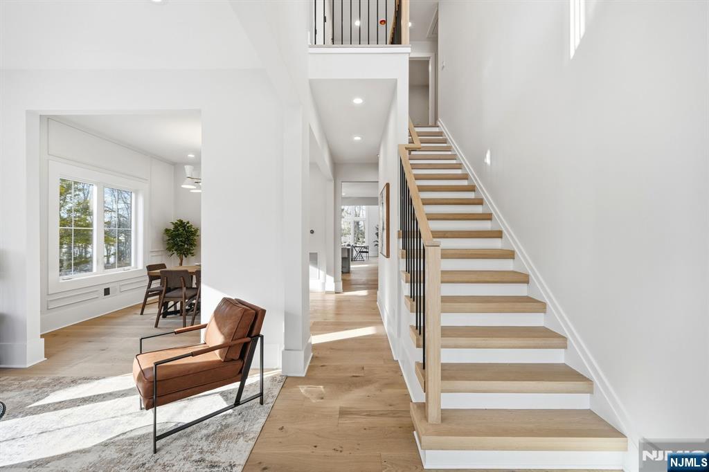 8 Montgomery Road Livingston, NJ 07039 - Photo 2 of 38 a view of entryway and hall with wooden floor