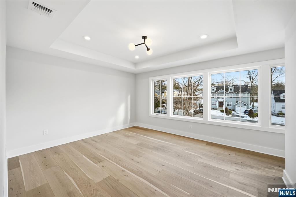8 Montgomery Road Livingston, NJ 07039 - Photo 21 of 38 a view of an empty room with a window