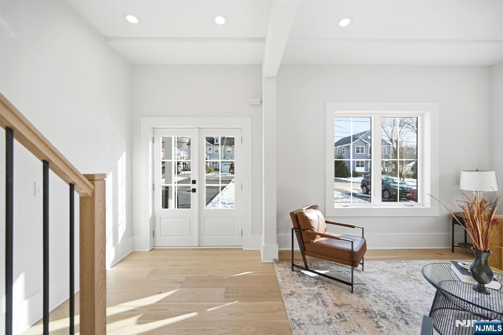 8 Montgomery Road Livingston, NJ 07039 - Photo 3 of 38 a living room with furniture and windows