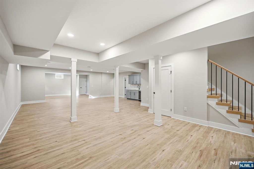 8 Montgomery Road Livingston, NJ 07039 - Photo 33 of 38 a view of empty room with wooden floor