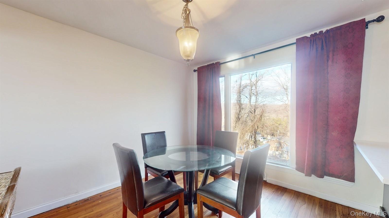 10 Rumbrook Road Elmsford, NY 10523 - Photo 5 of 25 Dining space with hardwood / wood-style floors