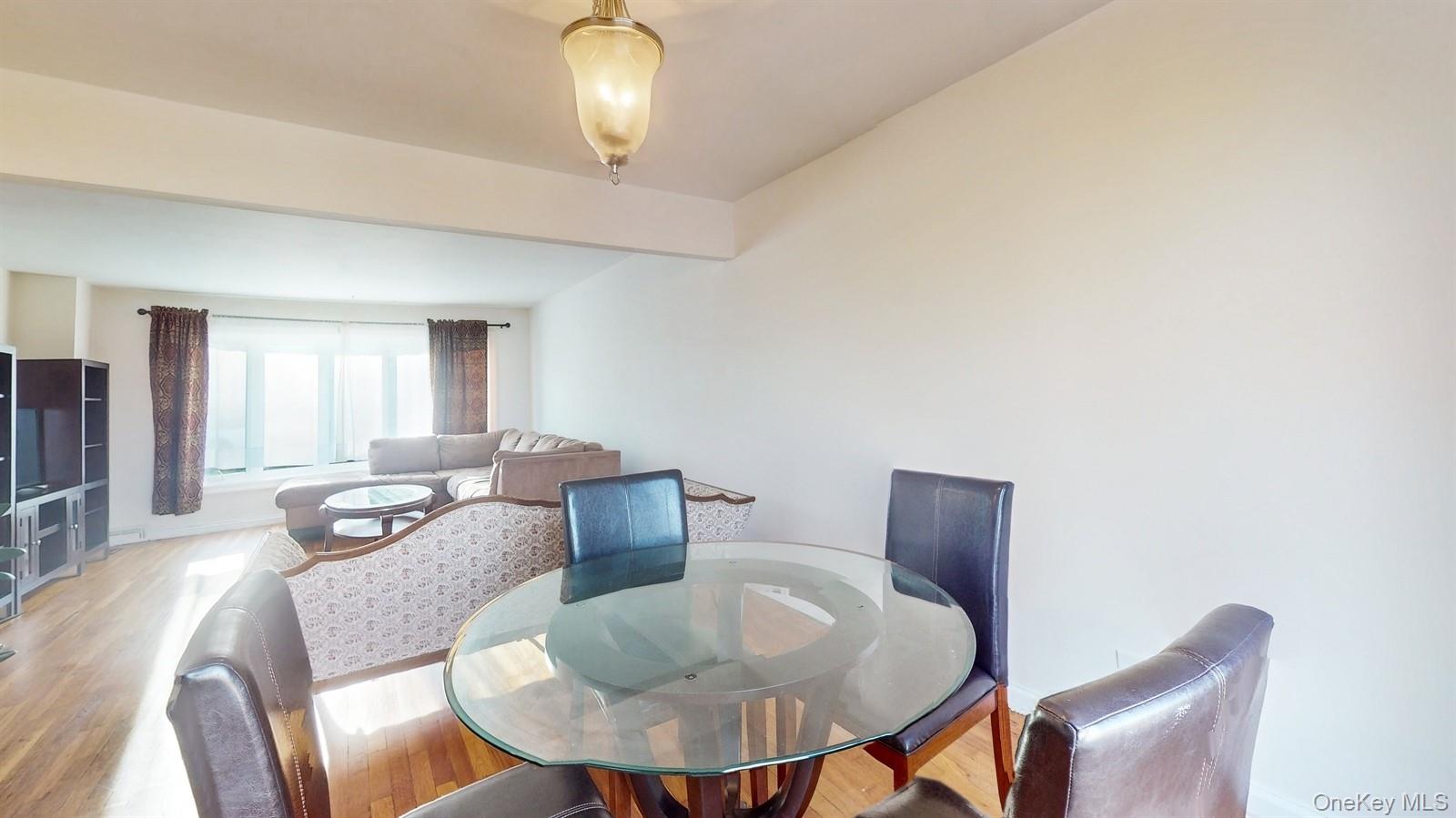 10 Rumbrook Road Elmsford, NY 10523 - Photo 6 of 25 Dining space with light hardwood / wood-style flooring