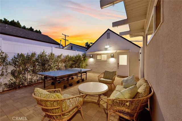 a bedroom with a bed and furniture