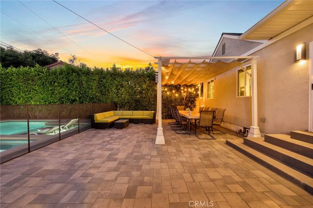 a view of a terrace with chairs
