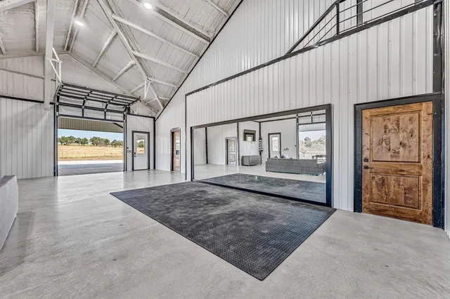 a view of an empty room with large window