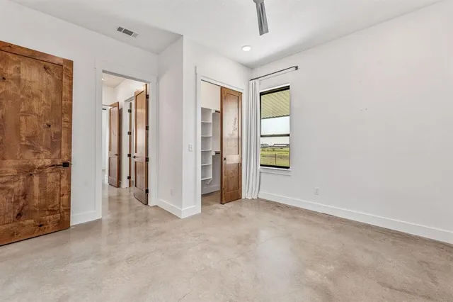 an empty room with windows