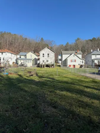 a view of a house with a big yard