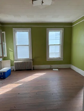 an empty room with windows