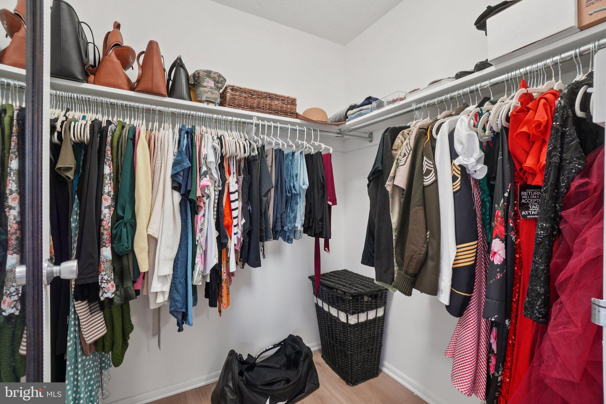 4600 South Four Mile Run Drive, Unit 842 Arlington, VA 22204 - Photo 15 of 24 a view of walk in closet with clothes and shoes