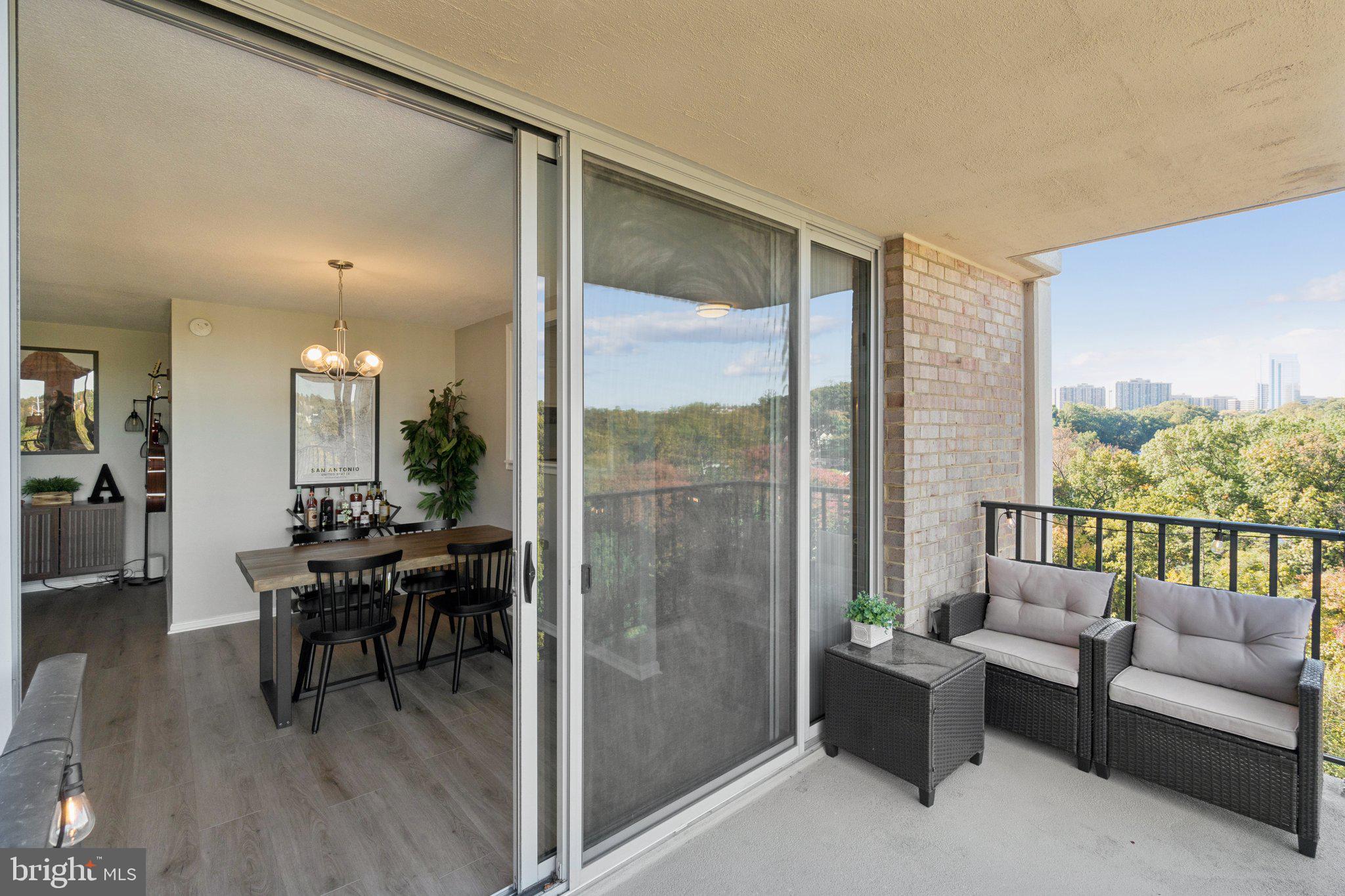 4600 South Four Mile Run Drive, Unit 842 Arlington, VA 22204 - Photo 20 of 24 a dining room with furniture and wooden floor