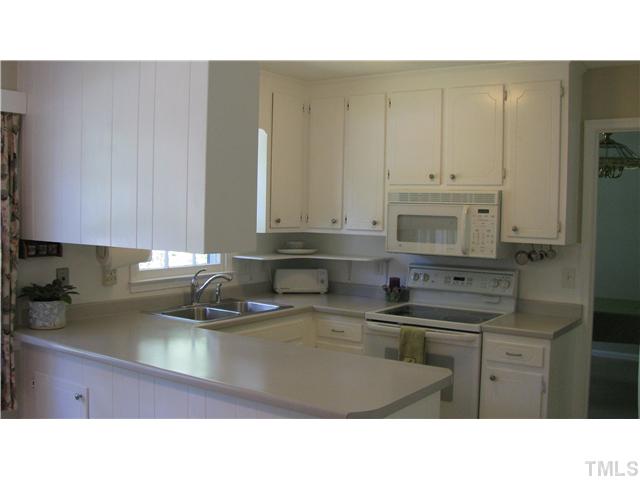 Kitchen has separate breakfast area for dining as well as a separate dining room.  Updates include new dishwasher and smooth-top stove!