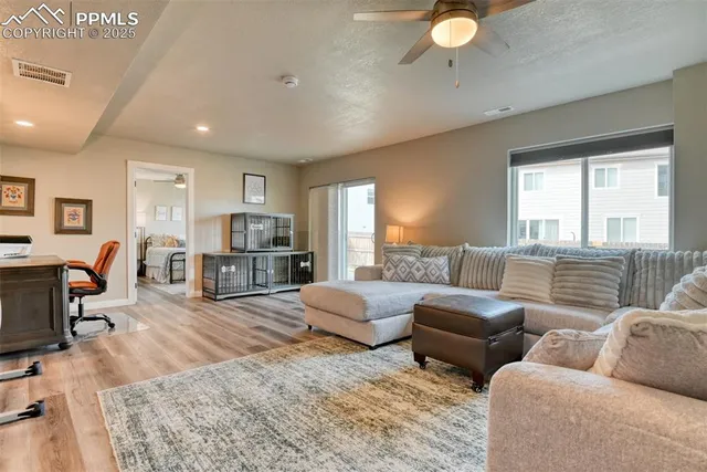 a living room with furniture and a table