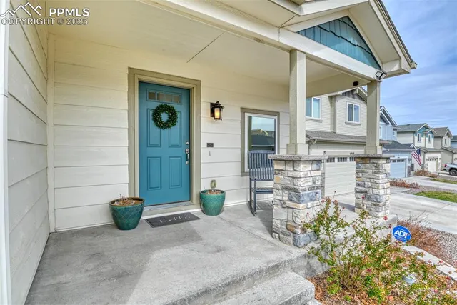 a view of a chairs and table in the patio
