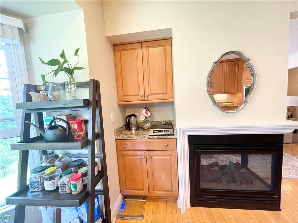 518 Farndale Road Pittsburgh, PA 15215 - Photo 13 of 37 a living room with painting on the wall and a window