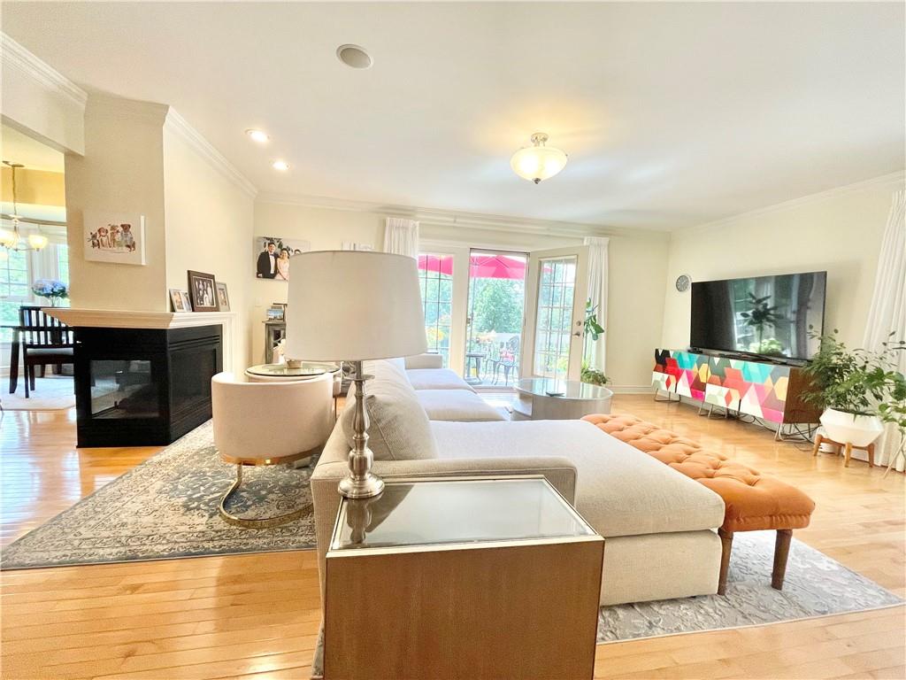 518 Farndale Road Pittsburgh, PA 15215 - Photo 19 of 37 a living room with furniture and a flat screen tv