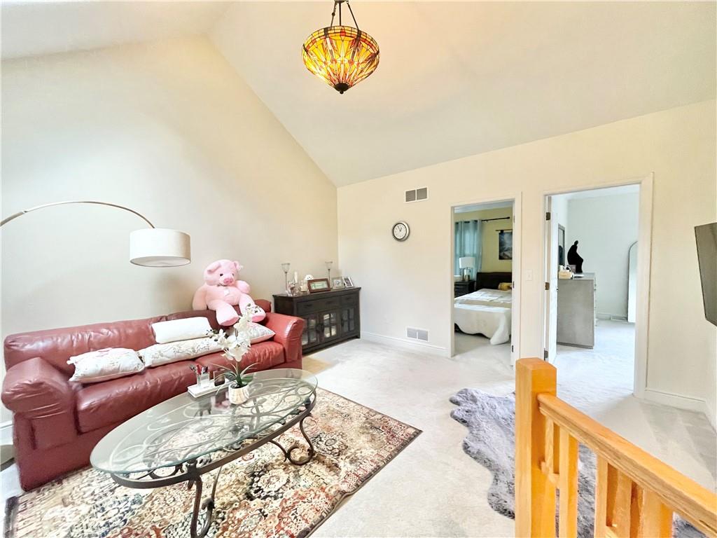 518 Farndale Road Pittsburgh, PA 15215 - Photo 24 of 37 a bedroom with furniture and a couch