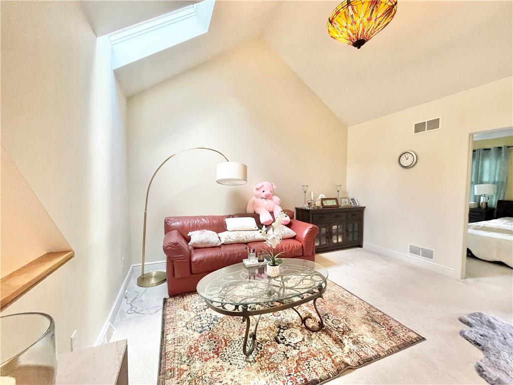 518 Farndale Road Pittsburgh, PA 15215 - Photo 25 of 37 a living room with furniture and a wooden floor