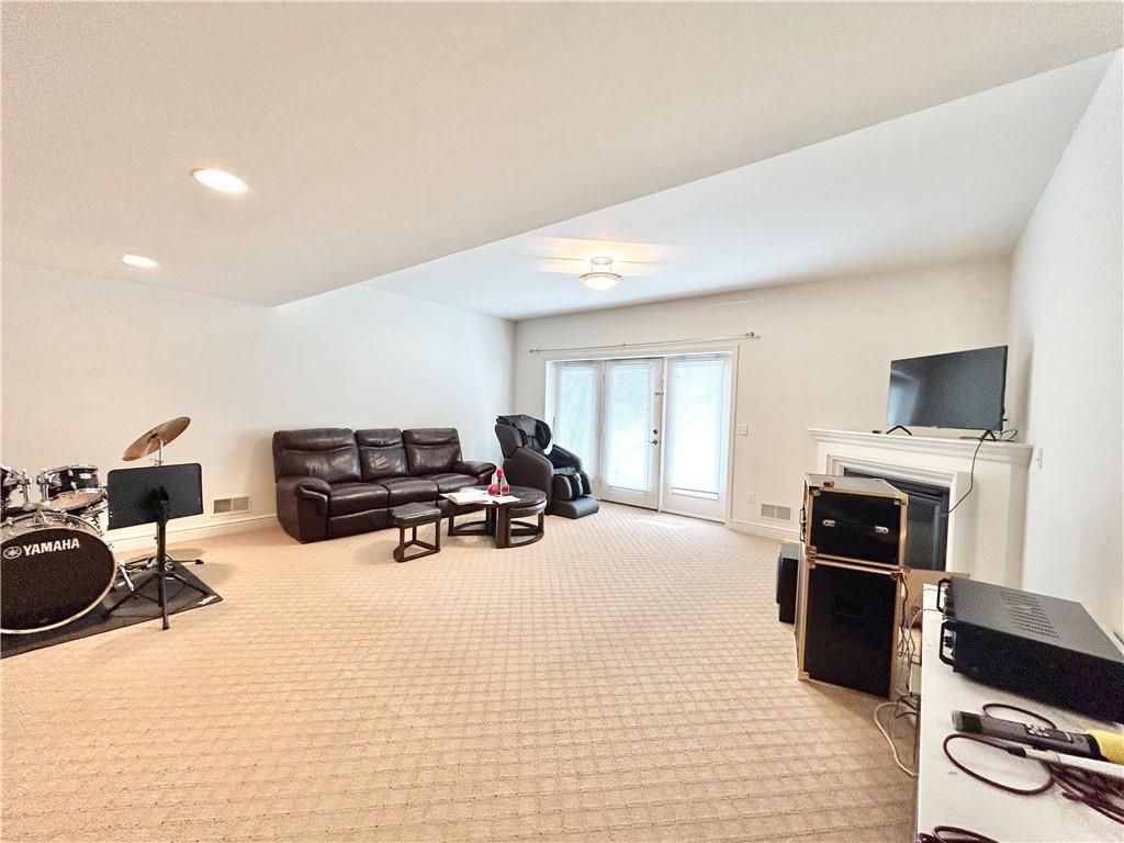 518 Farndale Road Pittsburgh, PA 15215 - Photo 34 of 37 a living room with furniture a flat screen tv and outdoor view