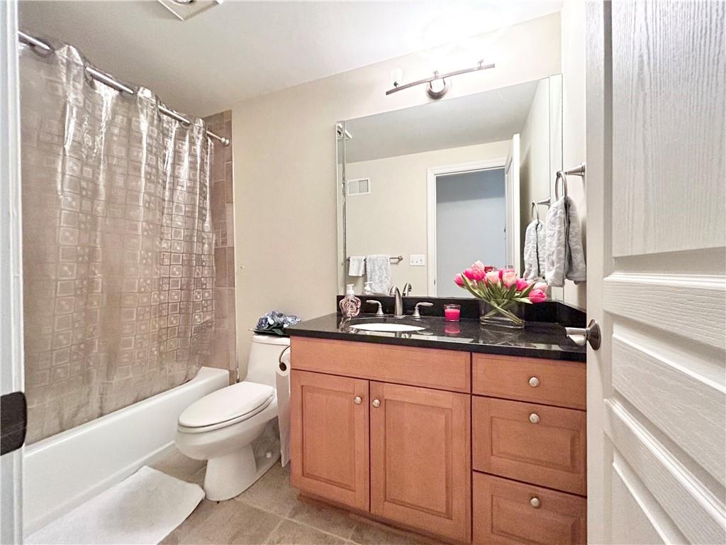 518 Farndale Road Pittsburgh, PA 15215 - Photo 35 of 37 a bathroom with a sink vanity mirror and toilet
