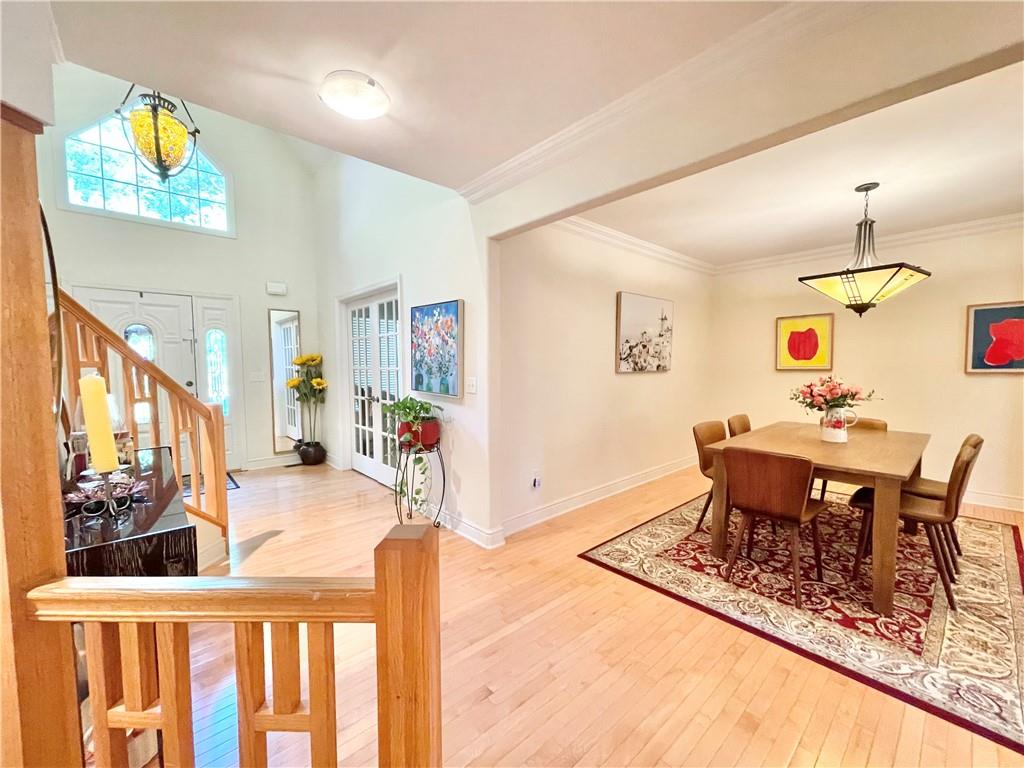 518 Farndale Road Pittsburgh, PA 15215 - Photo 8 of 37 a dining room with furniture and a floor to ceiling window