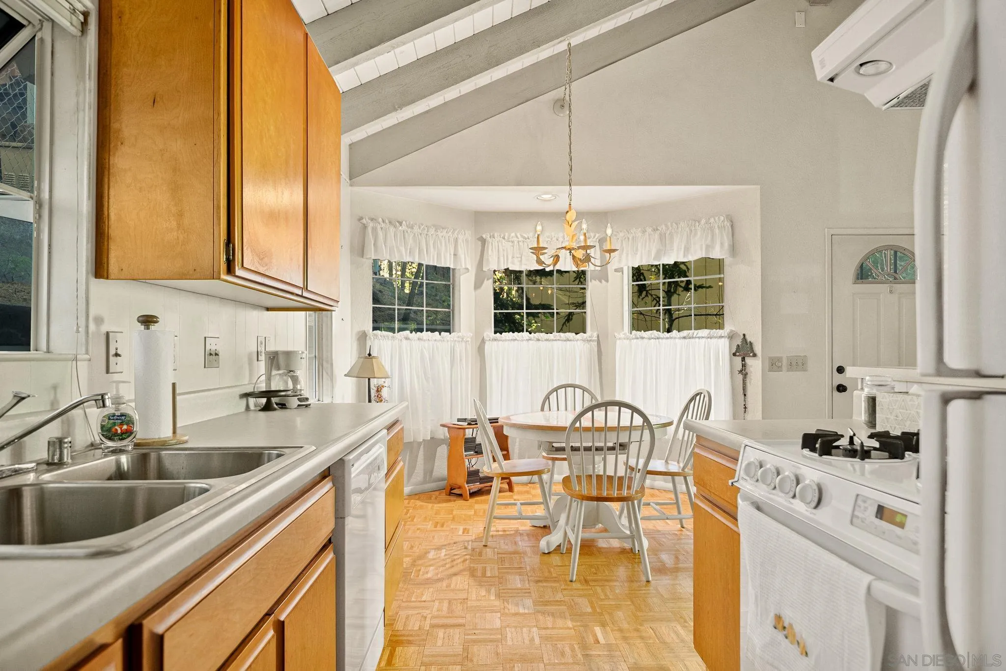 26582 Lake Forest Drive Twin Peaks, CA 92391 - Photo 15 of 25 a kitchen with a sink cabinets and window