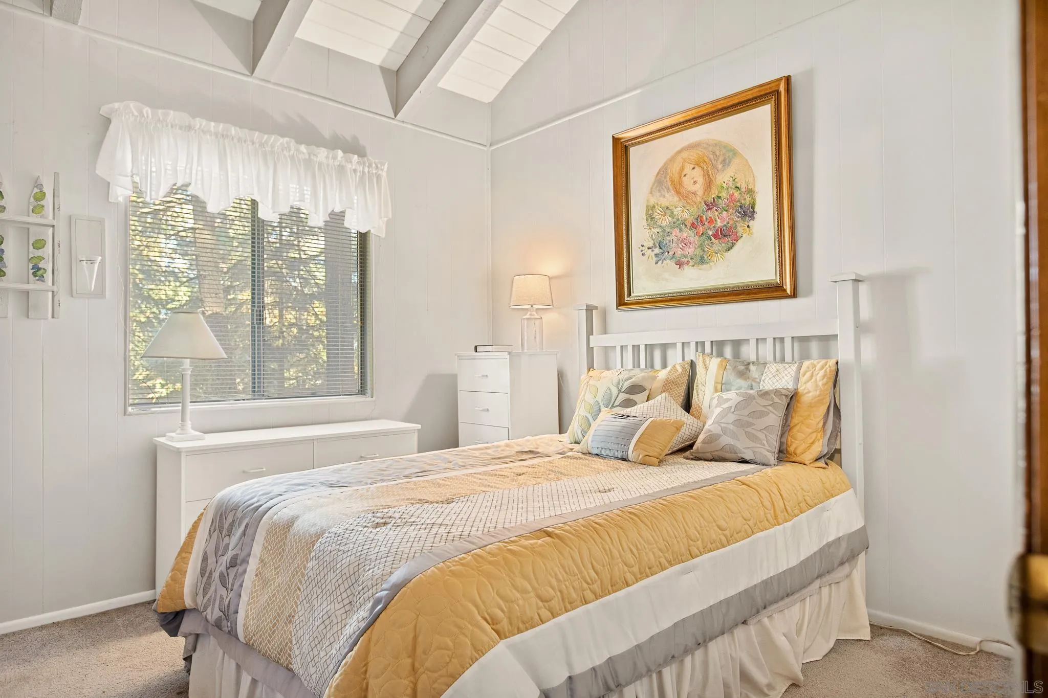 26582 Lake Forest Drive Twin Peaks, CA 92391 - Photo 16 of 25 a bedroom with a large bed and a window