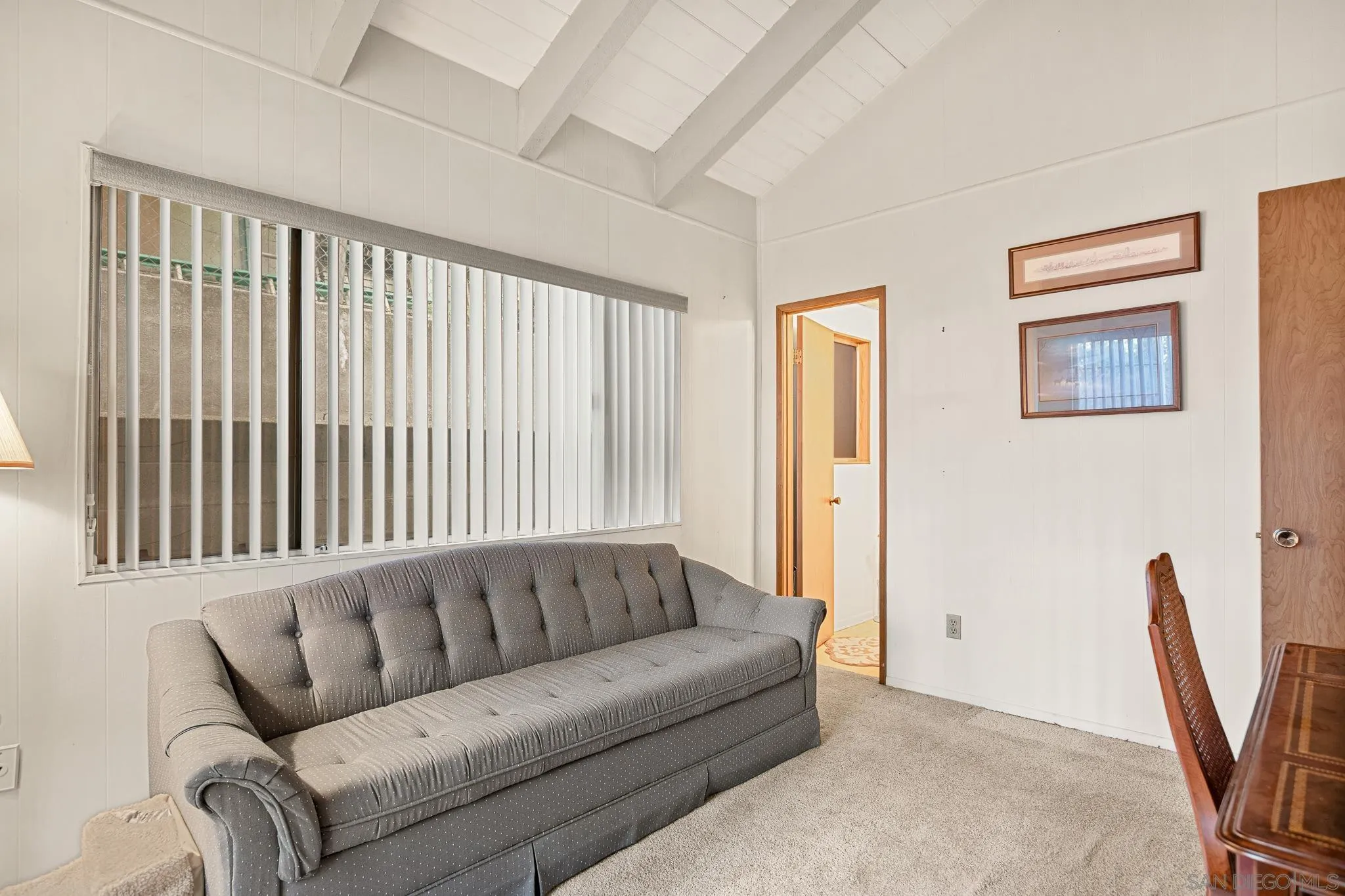 26582 Lake Forest Drive Twin Peaks, CA 92391 - Photo 19 of 25 a living room with furniture and a window