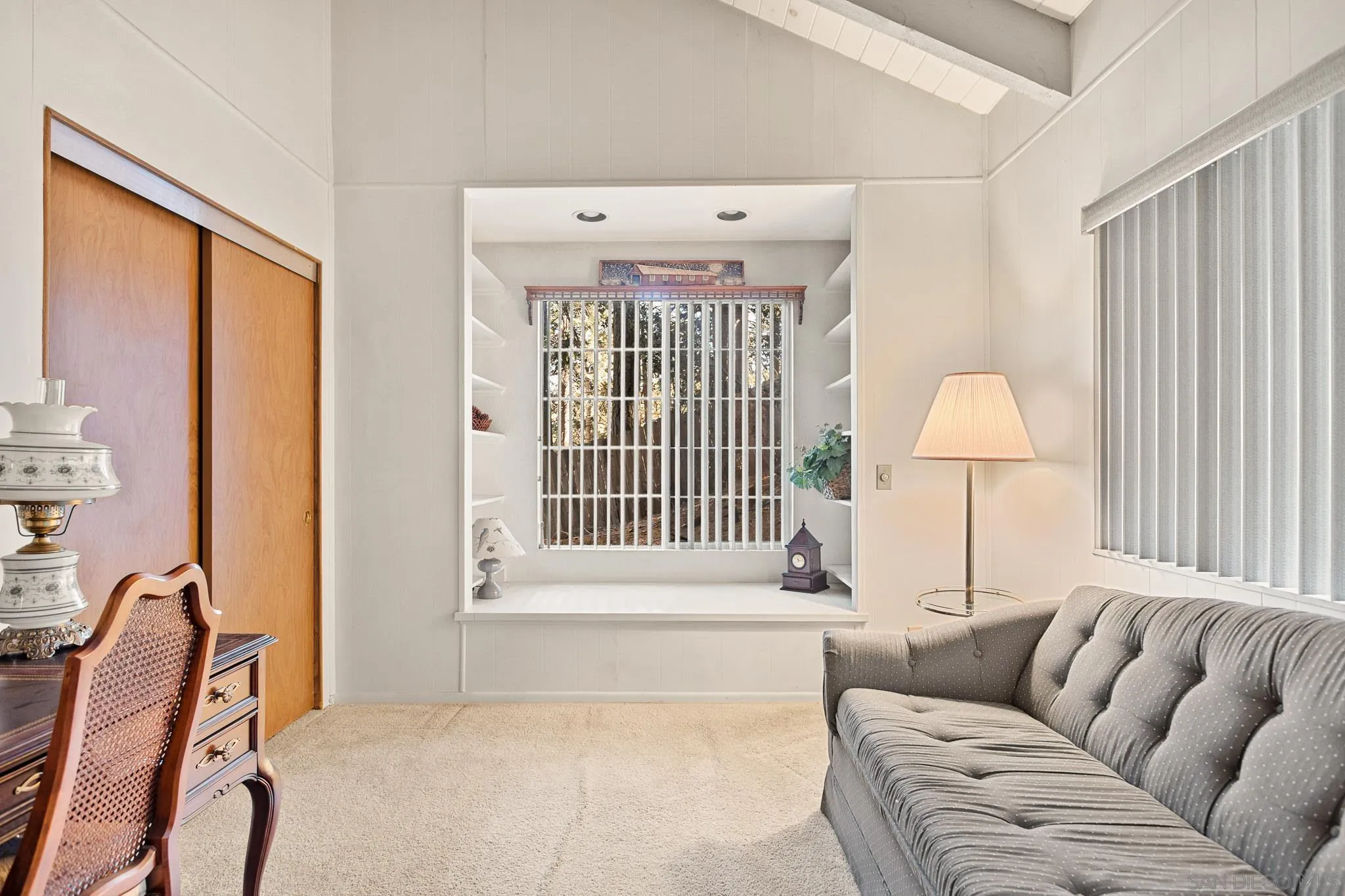 26582 Lake Forest Drive Twin Peaks, CA 92391 - Photo 20 of 25 a living room with furniture and a window