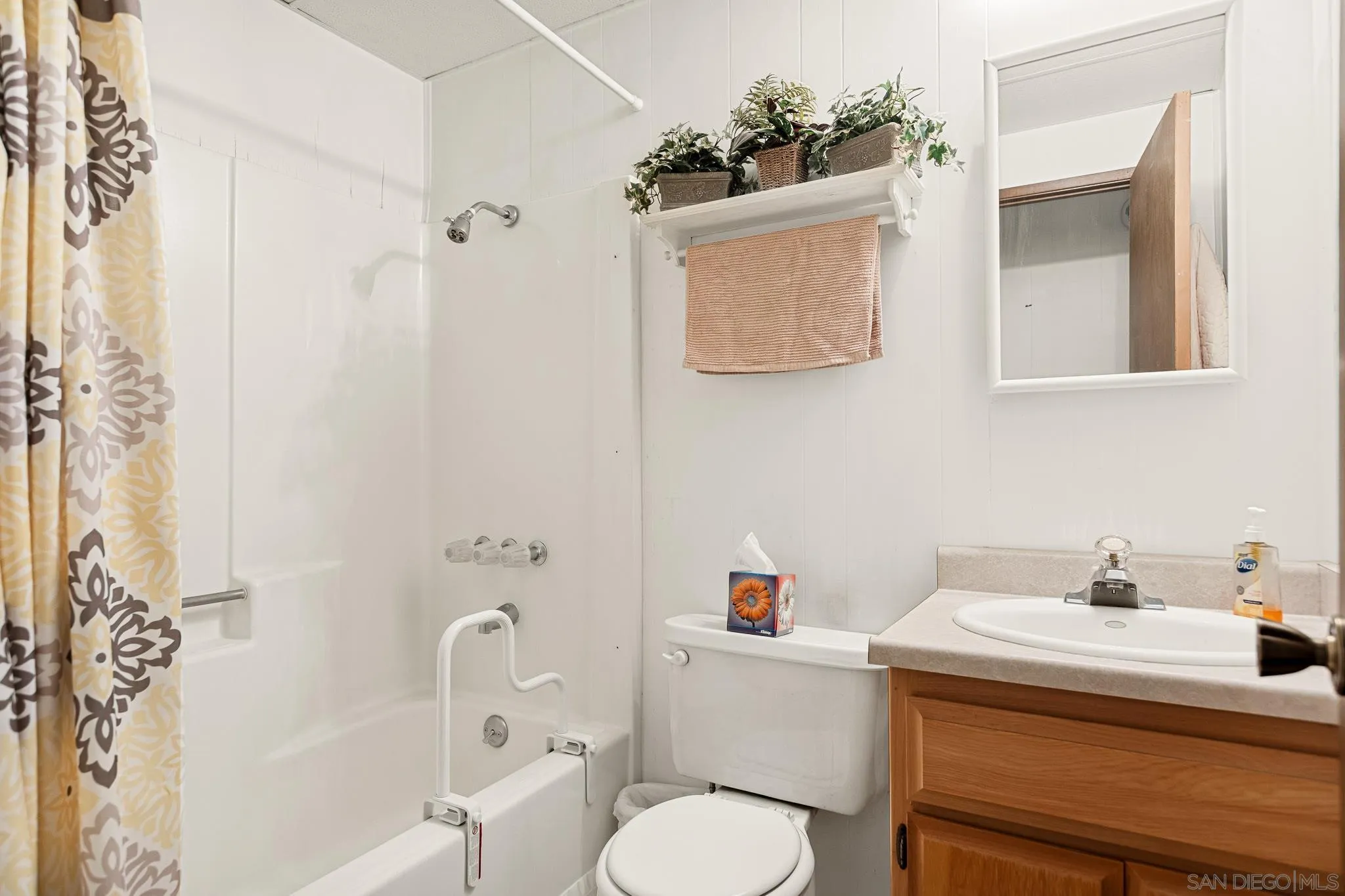 26582 Lake Forest Drive Twin Peaks, CA 92391 - Photo 25 of 25 a bathroom with a sink toilet and shower