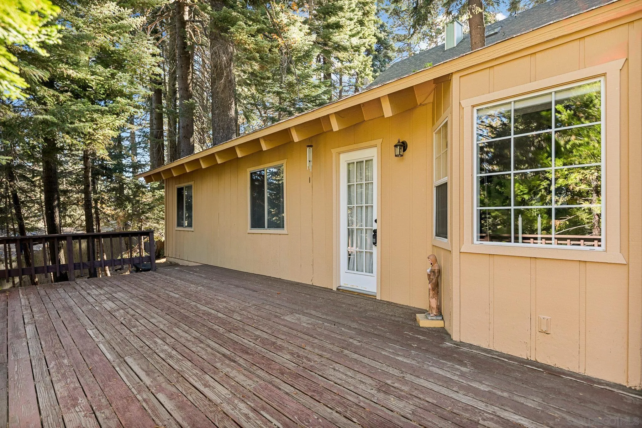 26582 Lake Forest Drive Twin Peaks, CA 92391 - Photo 4 of 25 a view of a house with a backyard