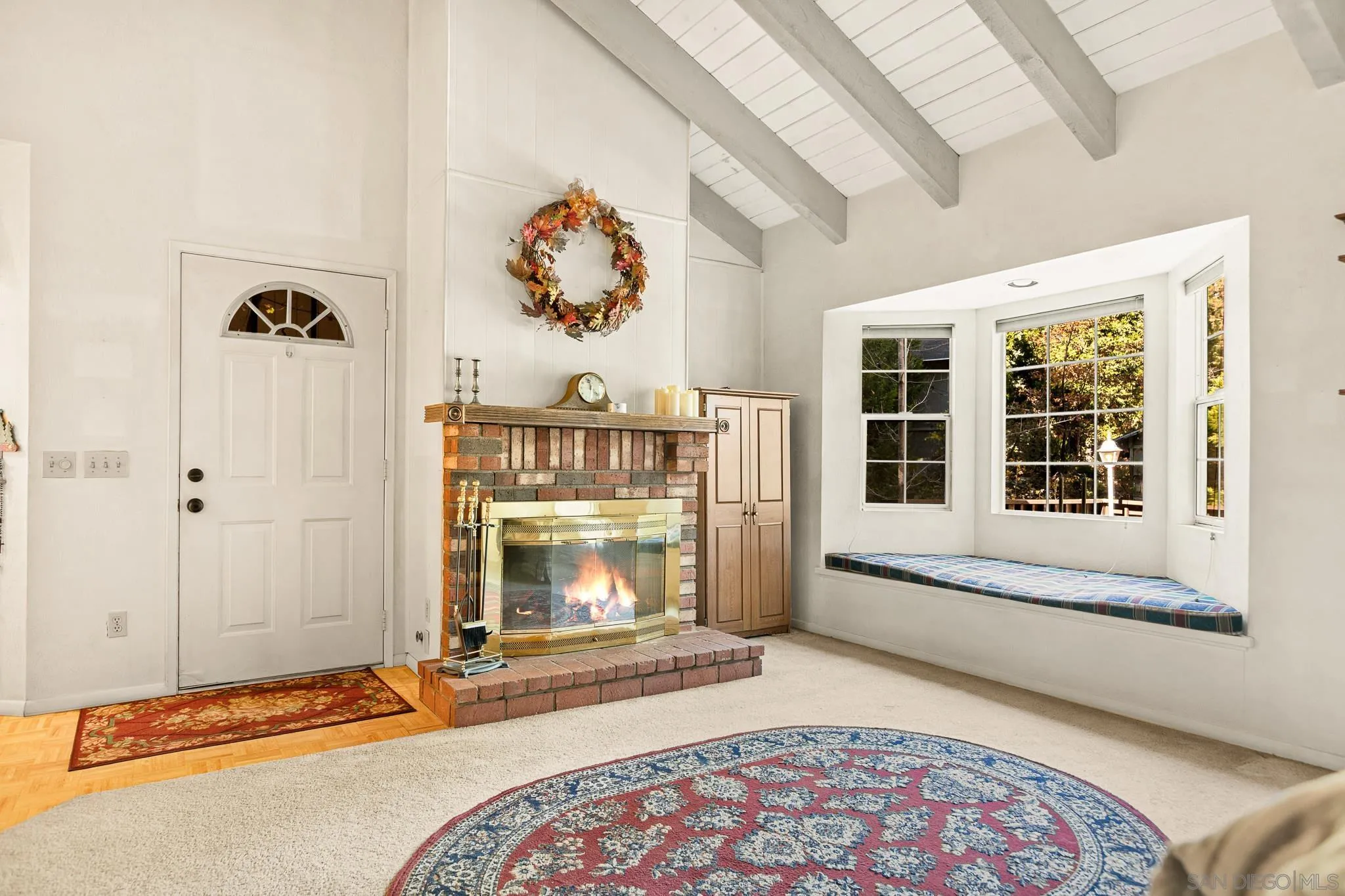 26582 Lake Forest Drive Twin Peaks, CA 92391 - Photo 6 of 25 a bedroom with a bed and a fireplace