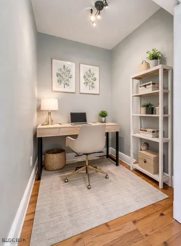 a workspace with wooden floor