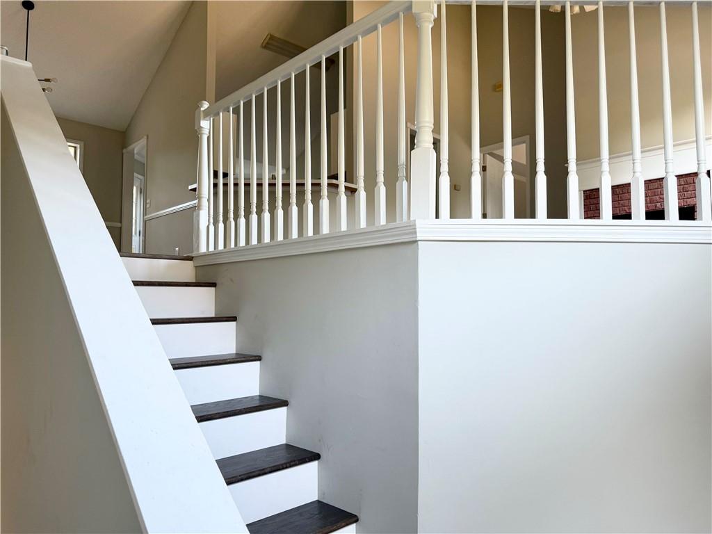 3162 Mosely Chase Drive Southwest Austell, GA 30106 - Photo 2 of 9 a view of staircase with white walls and a window