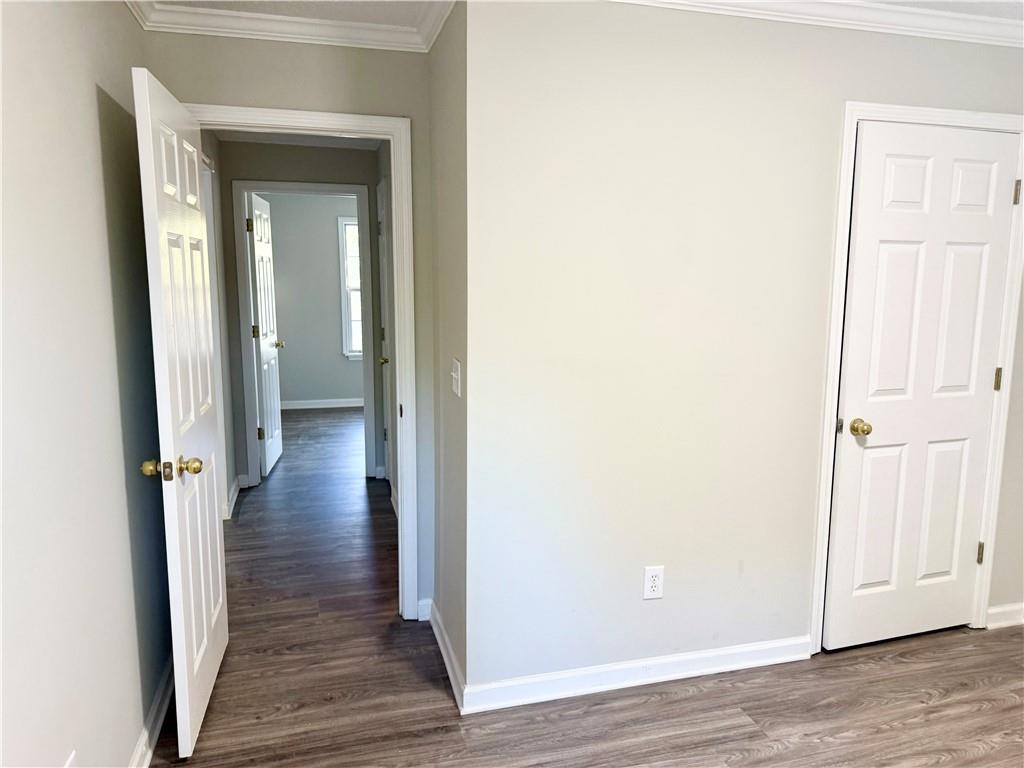 3162 Mosely Chase Drive Southwest Austell, GA 30106 - Photo 7 of 9 a view of a hallway with wooden floor