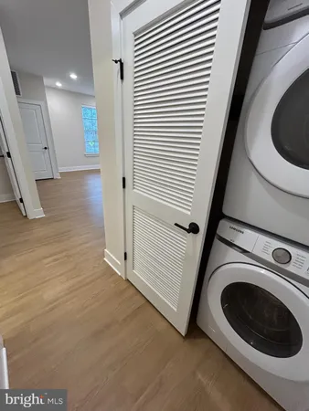 a view of a storage & utility room with washer and dryer