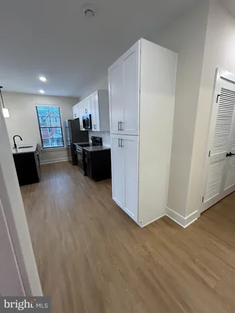 a view of a living room washer and dryer