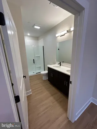 a bathroom with a sink a vanity and a mirror